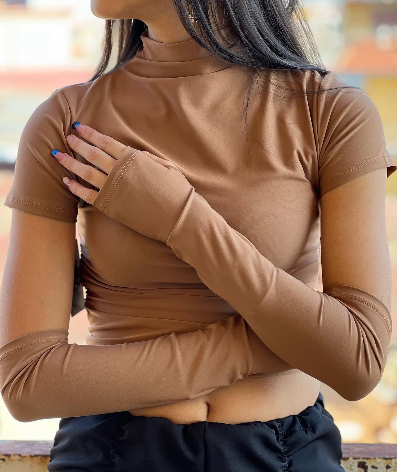 T-shirt con manicotti